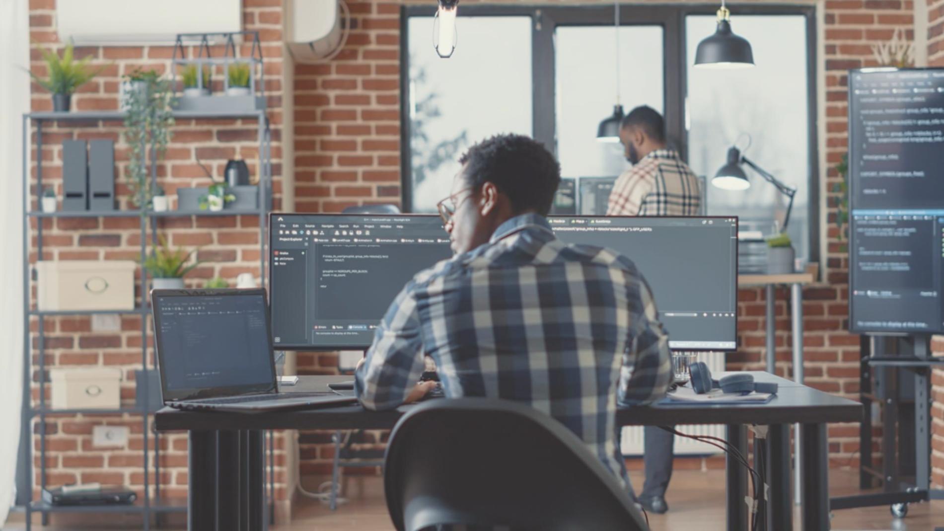Cybersecurity professional monitoring network security systems